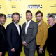 (left to right) Neil Gaiman with actors Michael Sheen, Jon Hamm, David Tennant, and Good Omens director Douglas Mackinnon.